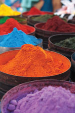 Dyes ground from natural sources are sold at the local market and are used to color traditional Inca dress